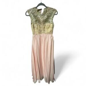 New with Tags formal dress size 3/4. Sheer top embroider cap sleeves